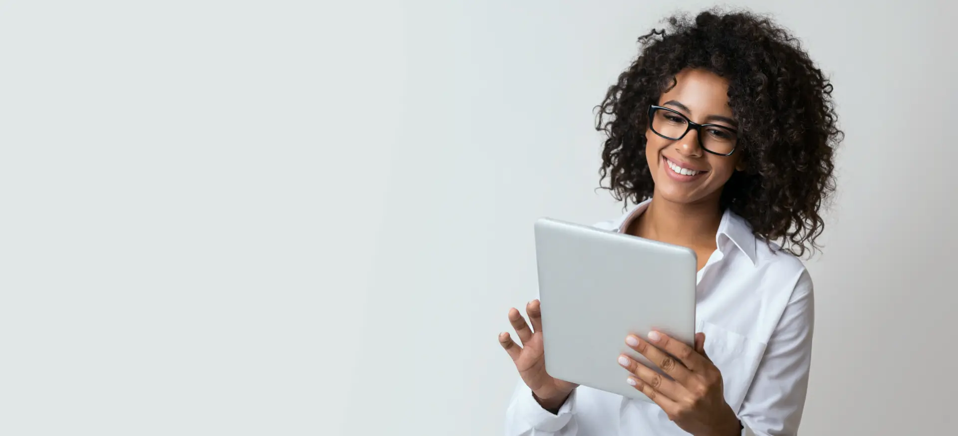 Woman smiling, representing a happy client after an SEO audit.